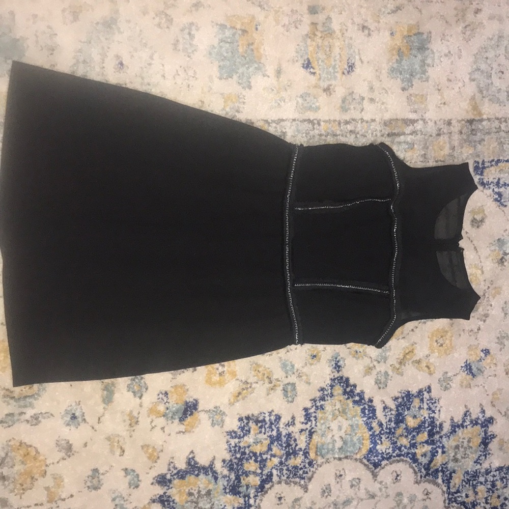 A Beautiful size small black short dress